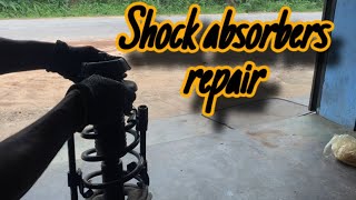 Shock absorbers repair suzuki swift  automobile mechanic [upl. by Matty]