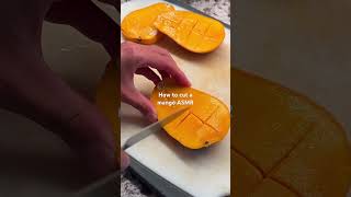 The LIFE SKILL you didn’t know you needed pt 2  how to cut a mango🥭 shorts fruitcutting [upl. by Uolyram]