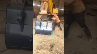 Locking pin installation process for replacing the bucket of the excavator [upl. by Peterson]