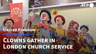 Clowns pay tribute to their grandfather Grimaldi with colourful church service in London  AFP [upl. by Aleyak]