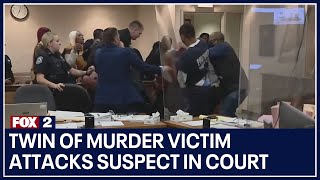 Twin of murder victim attacks suspect in court after seeing evidence video [upl. by Car]