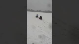 3 year old pulling sledge with a 36v 1000w Electric￼ quad bike [upl. by Cahan203]