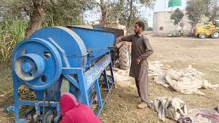 Extracting millet seed from thresher [upl. by Judd]