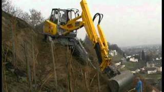 Menzi Muck A91 im Rebhang  Constructing vine yards [upl. by Eugnimod]