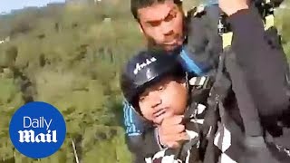 Hero pilot saves man after their paraglider SNAPS mid air [upl. by Airitac19]