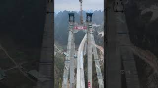 Another super project in Guizhou Huajiang Gorge Bridge is 2890 meters long with a main span o [upl. by Lajet]