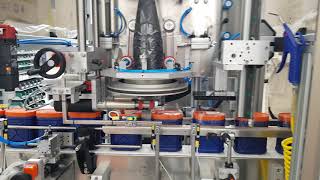 SCALIGERA PACKAGING Sleeve Applicator and Hot Air Shrink Tunnel for TAMPER EVIDENT Oval Jar 1500bph [upl. by Orelee]