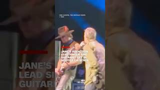 Janes Addiction lead singer and guitarist get in scuffle on stage [upl. by Idid]