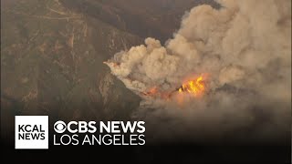 Pillars of smoke billow from 1900acre Airport Fire [upl. by Trainer]