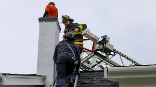 Child rescued after getting stuck in chimney at Mass home officials say [upl. by Lleda]