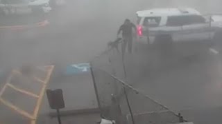 I love that dog  Officer fights through tornado to rescue K9 partner from patrol unit [upl. by Calvo781]