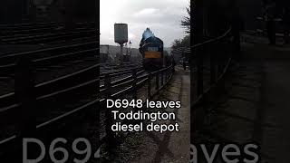 D6948 leaves Toddington diesel depot on the Gloucestershire and Warwickshire Steam Railway railway [upl. by Orimisac362]