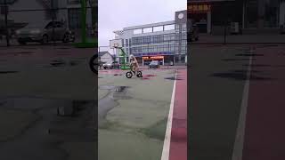 2724Poodle masters cycling on a basketball court in China [upl. by Vaclav]