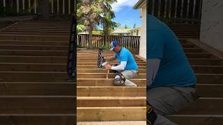 Installing some blocking and joist hangers on a treated wood deck building diy construction [upl. by Esereht]