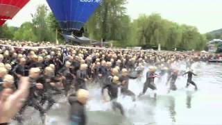 2013 Ironman Klagenfurt Official Start  Thousands of athletes swimming the Wörthersee [upl. by Haeluj418]