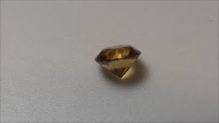 Faceting gemstones cutting a citirine round brilliant [upl. by Alarise]