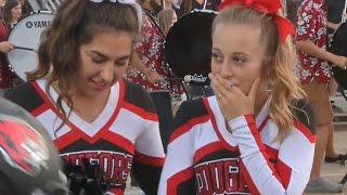 Football players kind gesture to cheerleader goes viral [upl. by Paviour]