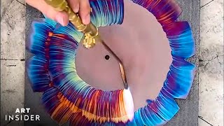 Artist Torches Colorful Designs On Copper Clocks [upl. by Kcerred]