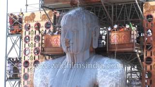 Jain devotees pour milk over the monolithic statue of Bahubali  Mahamastakabhishek Karnataka [upl. by Lanor990]