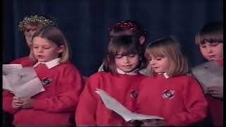 New Haw Junior School Choir singing Christmas Carols at community event New Haw Addlestone Surrey [upl. by Innep]