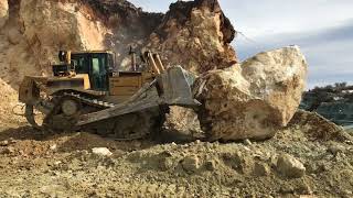 Caterpillar D8R Bulldozer Pushing Huge Stone  Labrianidis Mining Works [upl. by Arne789]