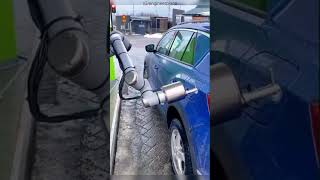 A car refueling at an automatic station quickly and effortlessly [upl. by Kamin]