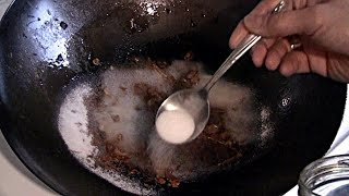 How To Clean And Restore A Burnt Wok Seasoning A Carbon Steel Wok How To Make A Wok NonStick [upl. by Basil720]