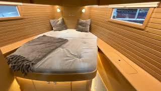 HallbergRassy 400 interior view Single aft cabin twin heads island forward cabin oak interior [upl. by Esac]