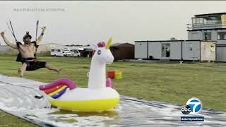 Skydiver lands directly on inflatable unicorn [upl. by Tarton30]