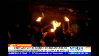 Cristianos católicos y ortodoxos celebran el santo fuego alrededor del Santo Sepulcro en Jerusalén [upl. by Fellner358]