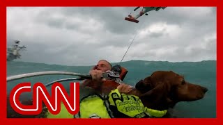 Helmet cam video shows dramatic rescue of dog and man during Hurricane Helene [upl. by Franck]