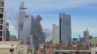 Fire rips through roof of skyscraper filling NYC skyline with smoke [upl. by Jessamyn]