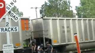 IDIOTS ON BIKES CROSS OVER STOPPED TRAIN [upl. by Aicilla391]