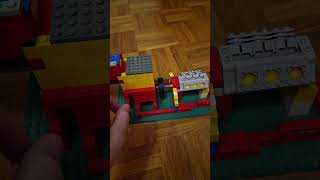 Lego piston vacuum engine [upl. by Boycey395]