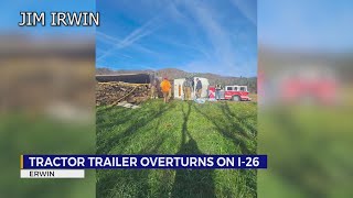 Tractortrailer carrying flood debris overturns on I26 entrance ramp in Erwin [upl. by Alocin636]