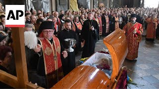 Thousands in Ukraine attend funeral of former lawmaker and critic of Russia who was killed in Lviv [upl. by Ninerb]