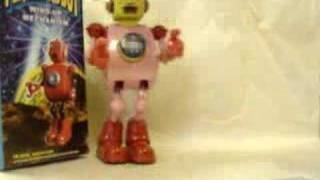 Schylling Planet Robot Tin Windup Space Toy Retro Pink [upl. by Bellamy319]