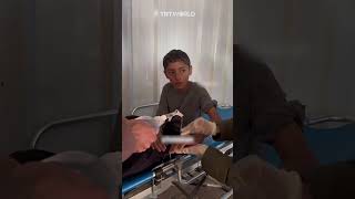 Palestinian child recites Quran to calm down while being treated [upl. by Ru426]