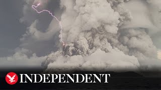 Tonga volcano eruption fills sky with black ash clouds [upl. by Itsirhc]