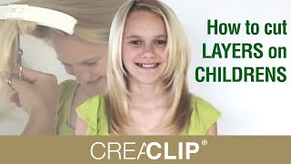 How to cut LAYERS on CHILDRENS hair tutorial Layered hairstyle [upl. by Oinota]