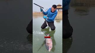 Man removes fish from ice 🧊 🐠 [upl. by Havelock]