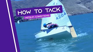 OPTIMIST SAILING  How To Tack  Medium Conditions [upl. by Karlyn]