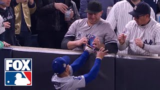 Yankees fan pulls ball out of Mookie Betts glove in World Series Game 4  MLB on FOX [upl. by Hilten816]