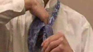 How to Tie a Tie  Windsor Knot  2tieatiecom [upl. by Arihaj]