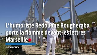 L’humoriste Redouane Bougheraba porte la flamme devant les lettres Marseille [upl. by Shaylah24]