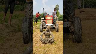 Statue in front of tractor [upl. by Ahsirek]