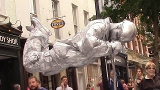 Silver man secret revealed London street performer floating and levitating trick [upl. by Greene810]