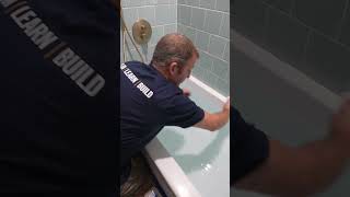 Caulking a Tub [upl. by Lemuelah]