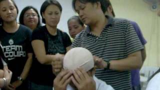 First Aid  Recurrent Elastic Bandaging of the Head [upl. by Aihceyt]