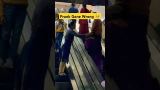 Escalator Prank Gone Wrong 🥹  shorts prank random funny escalator reactionvideo [upl. by Asyen645]